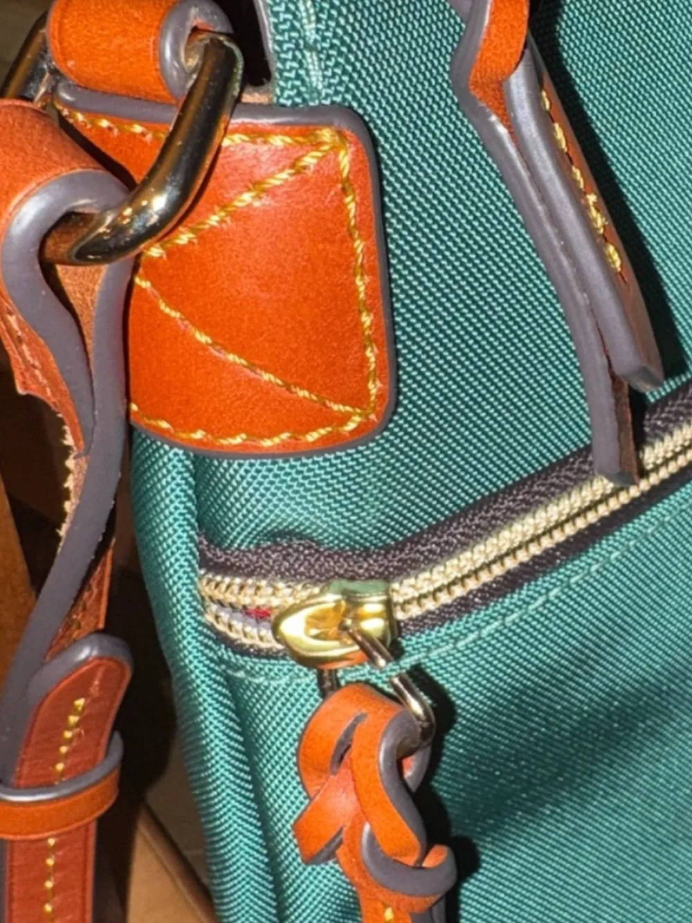 Dooney & Bourke reposhing this